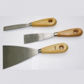 Metal spatula with wooden handle